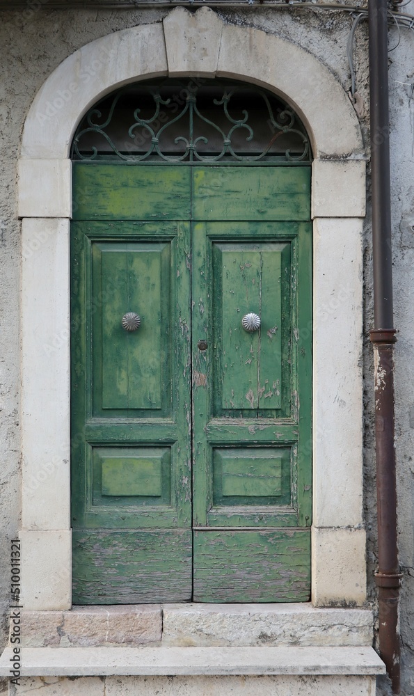 Old Green Wooden Door in Central Italy Rural Village Old Green Wooden Door in Central Italy Rural Village