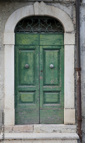 Old Green Wooden Door in Central Italy Rural Village © Monica