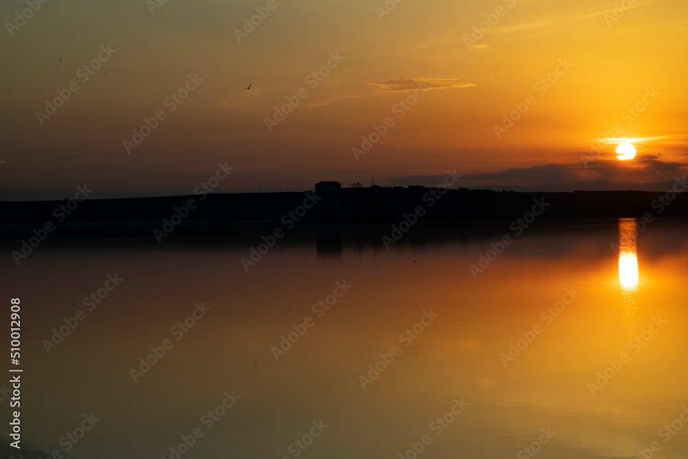 Summer beautiful sunset on the lake of Azerbaijan