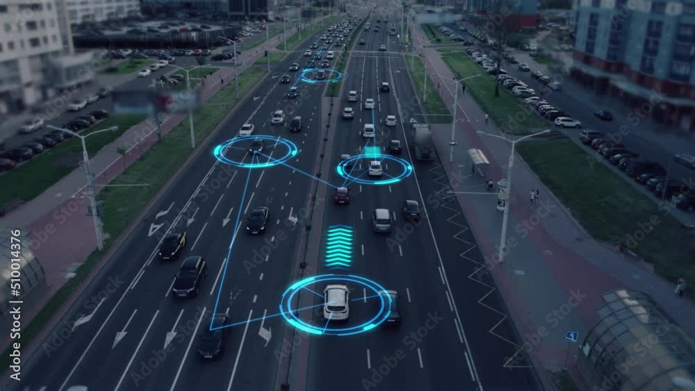 Autonomous self-driving driverless cars of the future, controlled by a system with artificial intelligence, move along a busy city street, scanning with sensors the road situation and distance. UHD 4K