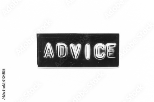 Black color banner that have embossed letter with word on white paper background