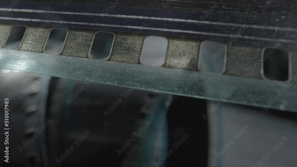 Scuff Camera Effects Camera vintage negative film. Selective focus on film perforation. Old ...