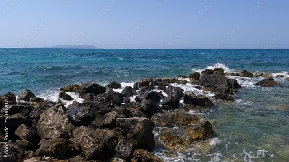 the turquoise sea spills onto the beach of Crete the turquoise sea spills onto the beach of Crete