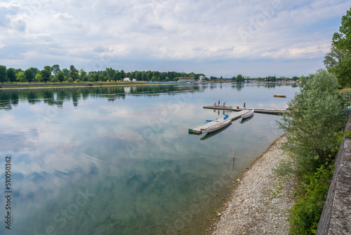 Nice view of Idroscalo lake park, on the left the stands, on the right a quay where young  boys and girls prepare their canoes to training. photo