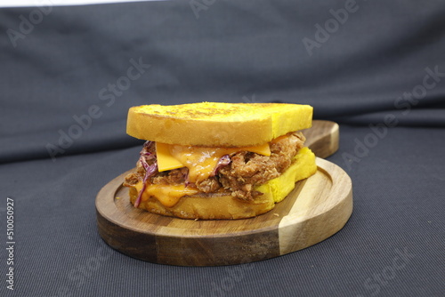 Slice chicken burger wood board