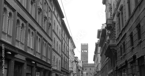 Black and white view of famous and historic architecture and city center in Bologna, Italy. photo