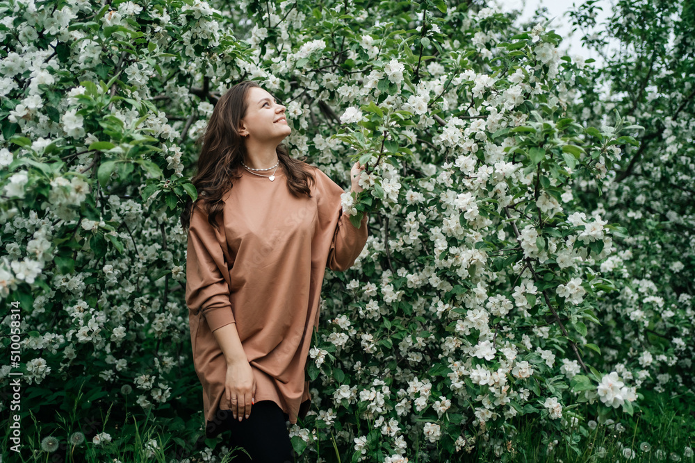 beautiful girl in blooming apple tree aroma of flowers outdoor nature beautiful girl in blooming apple tree aroma of flowers outdoor nature