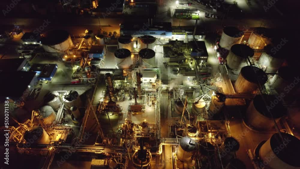 Aerial view of oil refinery facility terminal. Industrial factory for produce and storage of crude oil and petrochemicals for oil energy and power manufacturing products. Industrial plant. Aerial view of oil refinery facility terminal. Industrial factory for produce and storage of crude oil and petrochemicals for oil energy and power manufacturing products. Industrial plant.