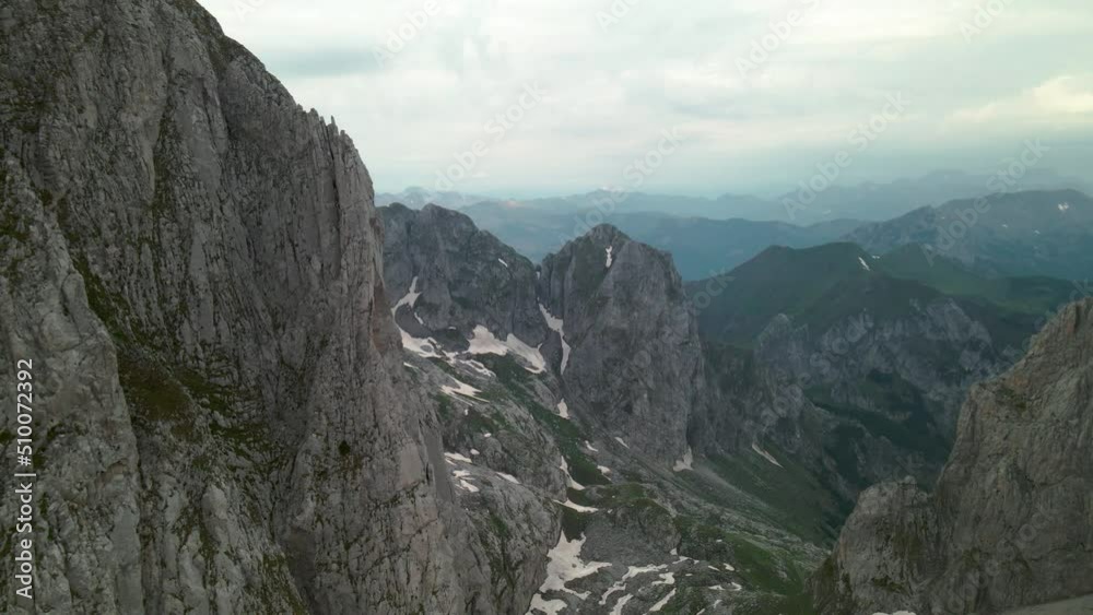 Flying close to exposed mountain walls in the Albanian Alps Flying close to exposed mountain walls in the Albanian Alps