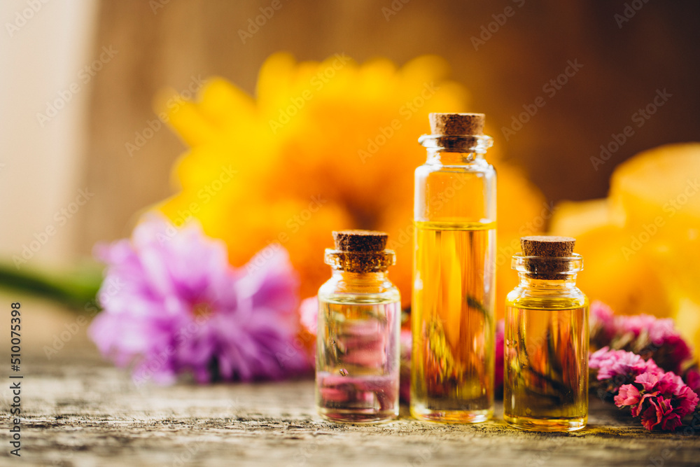 Oil bottle. Spa concept. Oil. Wellness. Wooden table. Aroma. Background Oil bottle. Spa concept. Oil. Wellness. Wooden table. Aroma. Background