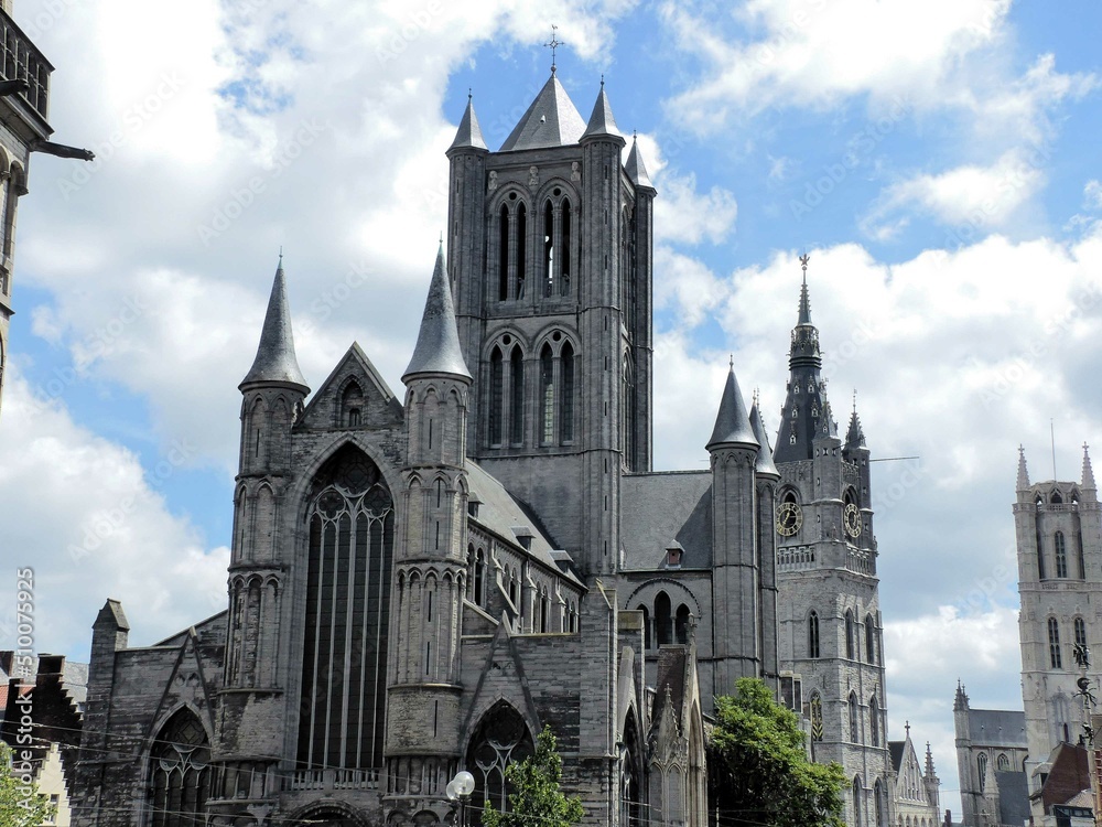 Ghent, France - July 2018: Visit to the beautiful city of Ghent in Belgium, view of the Saint Nicolas Church 