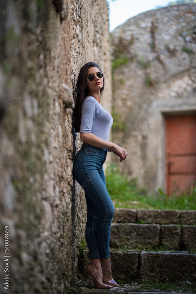 girl in jeans and décolleté girl in jeans and décolleté