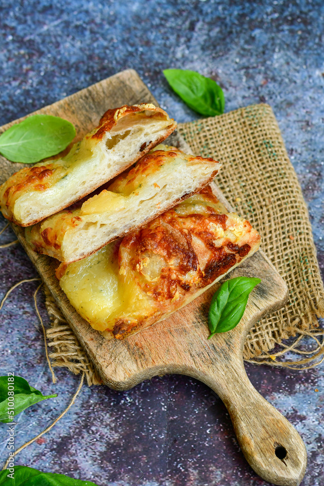 Italian Focaccia four cheese with crispy crust Full 72 hour pizza dough fermentation method. Roman style pizza slice Italian Focaccia four cheese with crispy crust Full 72 hour pizza dough fermentation method. Roman style pizza slice