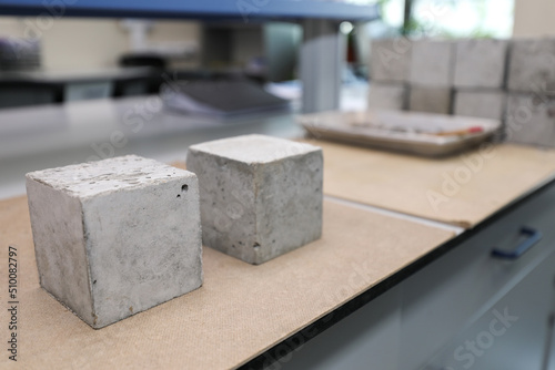 Modern laboratory for testing road samples and materials concept. Cement concrete samples for testing.