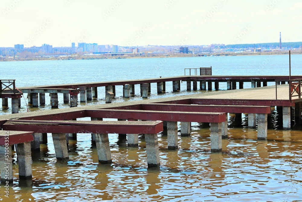 Fototapeta premium An old, empty pier on the lake