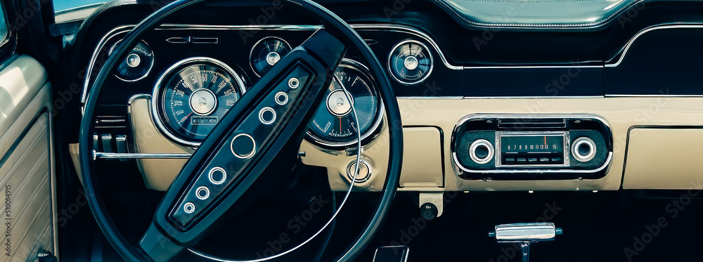 Old sports car dashboard, vintage film style image - obrazy, fototapety, plakaty 
