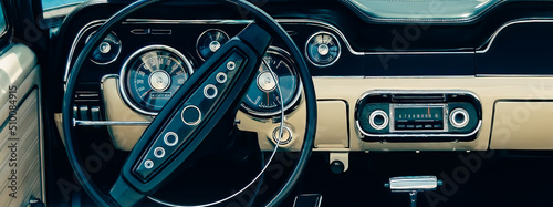 Canvas Print Old sports car dashboard, vintage film style image