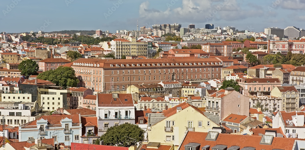 High angle view on traditional houses with orange tiled roofs in the city of Lisbon, Portugal
