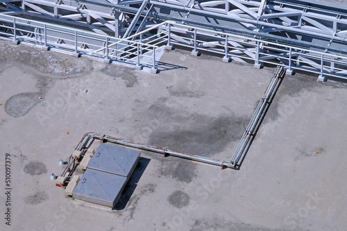 Top view industrial pipe of electrical wires installed on the rooftop photo