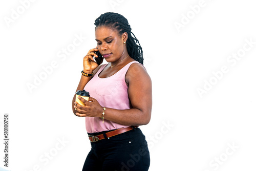 beautiful woman holding cup of coffee and talking on mobile phone.
