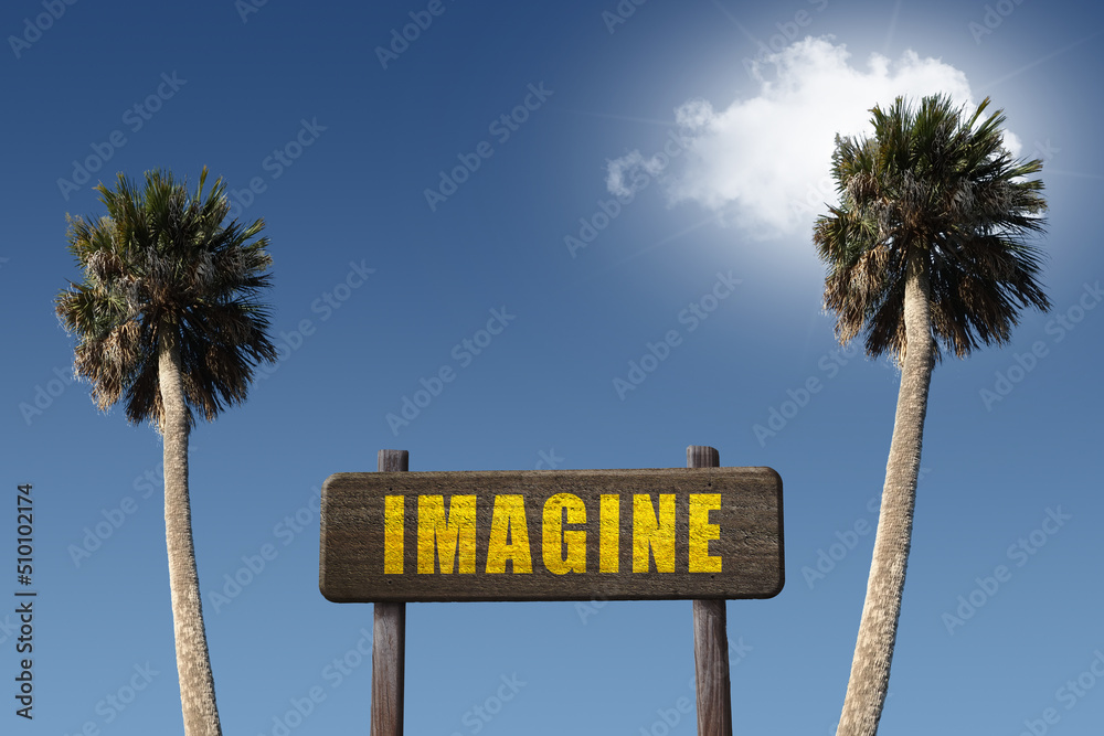 Naklejka premium Imagine sign and palm trees for creative thinking concept.