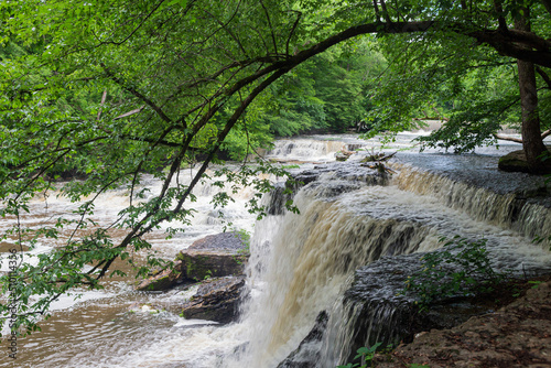 Rushing water over Blue Hole Falls, Old Fort State Park, Manchester, Tennessee, after a rainstorm.