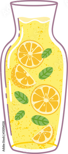Lemon drink with mint in glass jug