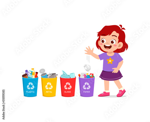 little kid throw paper waste to recycle bin