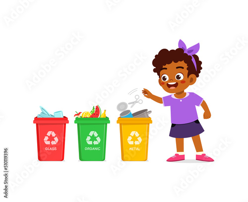 little kid throw metal waste to recycle bin