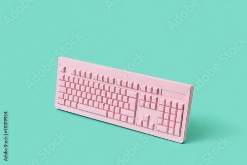 Wireless pc keyboard made of pink paper photo