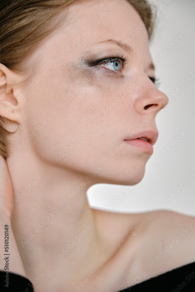portrait of a fragile girl with a strong look close-up with blurry eyes portrait of a fragile girl with a strong look close-up with blurry eyes