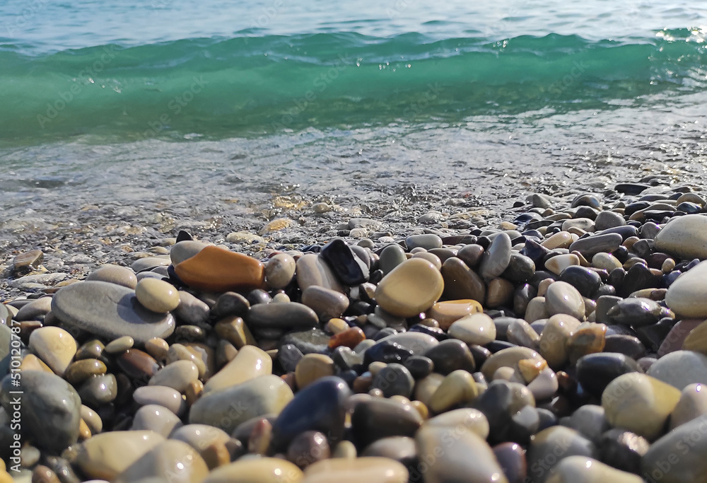 Pebble gravel sea stones natural beach background. Partly blurred out of focus. Pebble gravel sea stones natural beach background. Partly blurred out of focus.