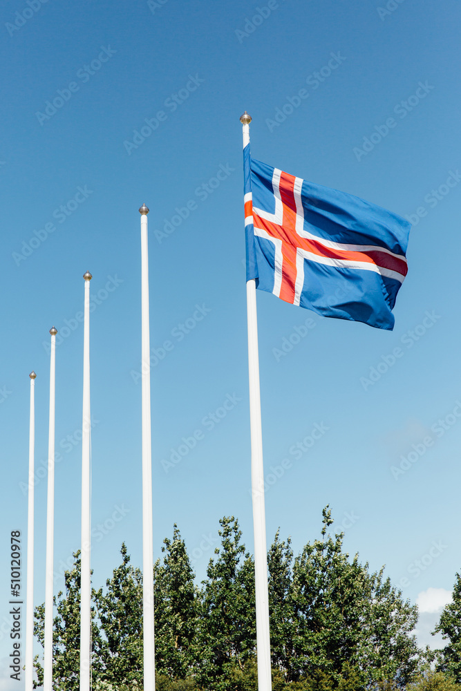 Icelandic flag on a white flagpost Icelandic flag on a white flagpost