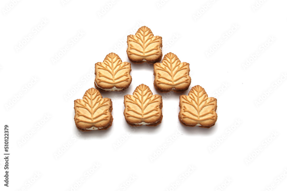 Delicious cookies filled with vanilla cream made with honey or maple syrup from Canadian trees, the traditional sweet of Canada on a white background Delicious cookies filled with vanilla cream made with honey or maple syrup from Canadian trees, the traditional sweet of Canada on a white background