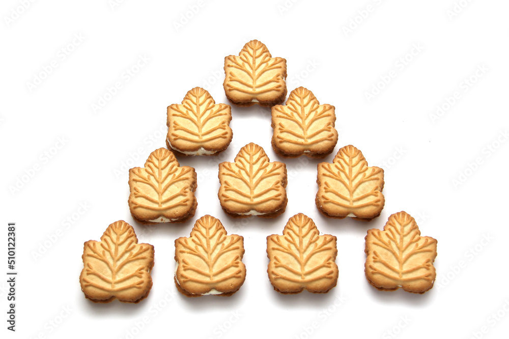 Delicious cookies filled with vanilla cream made with honey or maple syrup from Canadian trees, the traditional sweet of Canada on a white background Delicious cookies filled with vanilla cream made with honey or maple syrup from Canadian trees, the traditional sweet of Canada on a white background