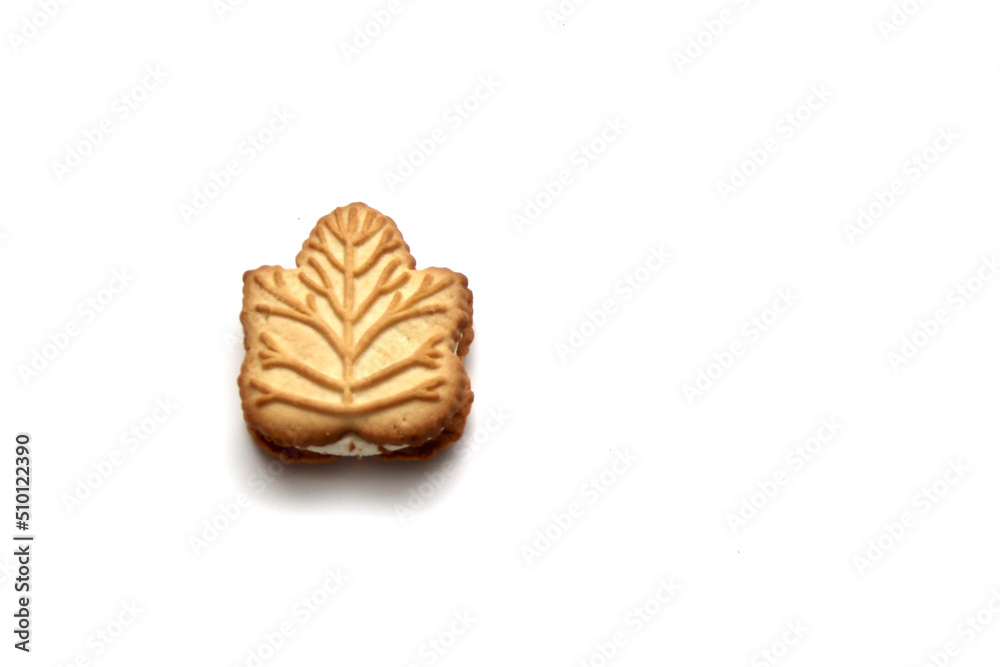 Delicious cookies filled with vanilla cream made with honey or maple syrup from Canadian trees, the traditional sweet of Canada on a white background Delicious cookies filled with vanilla cream made with honey or maple syrup from Canadian trees, the traditional sweet of Canada on a white background