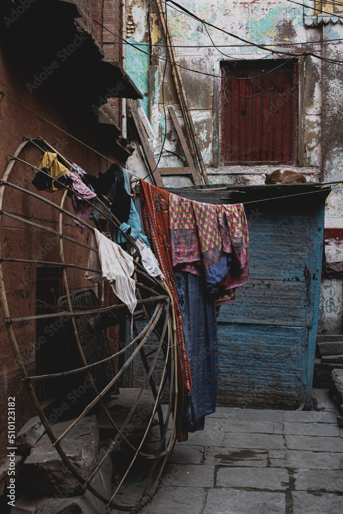 © Oxana Pervomay/Stocksy - Old drying clothes.
