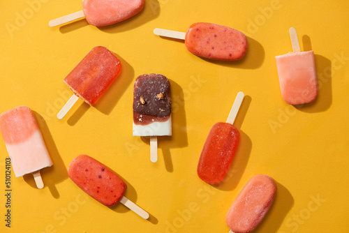 Colorful homemade popsicle with yogurt and berries 