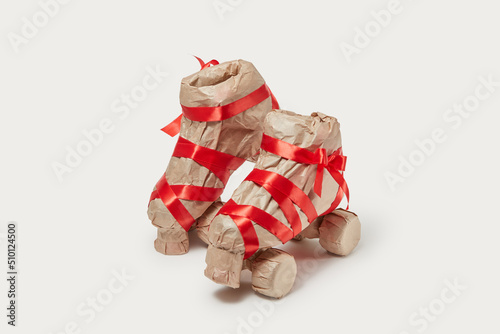 Rollerblades wrapped in carft paper
