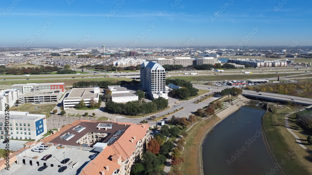 Top view brand new high-rise apartment complex with office buildings in background near Dallas, Texas, America