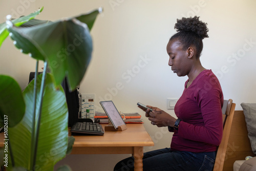 female entrepreneur, woman freelancer with smartphone, work from home photo