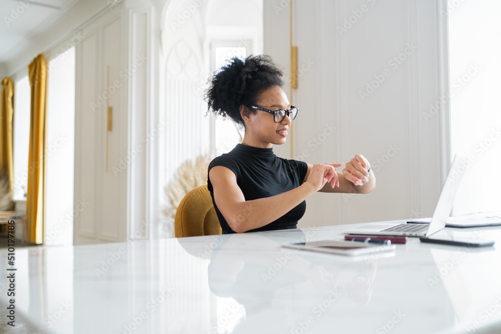 Obraz premium Female designer in the office online training, computer work, surfing the Internet