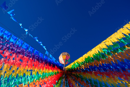 bandeiras coloridas e balões decorativos de festa junina no brasil photo