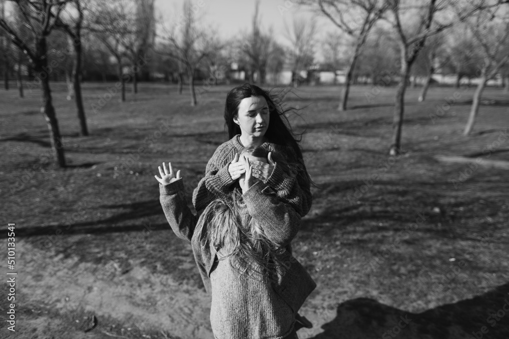 black and white portrait of a woman and a girl black and white portrait of a woman and a girl