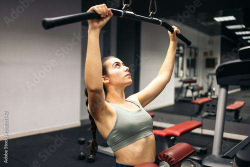 Woman training in the gym photo