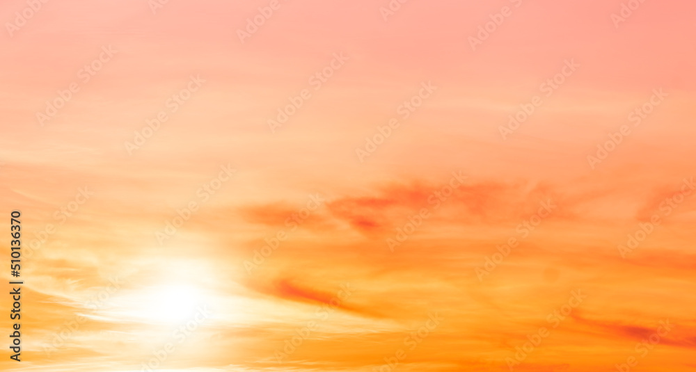 Fototapeta premium Evening sky with sunset romantic colorful sunlight with bright orange, yellow and pink dramatic nature pastel background.