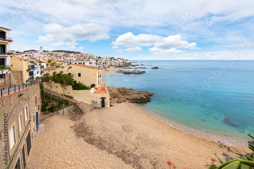 The whitewashed fishing village of Calella de Palafrugel near Barcelona on the Costa Brava coast of Southern Spain, with it's rocky coastline, bay and small town.