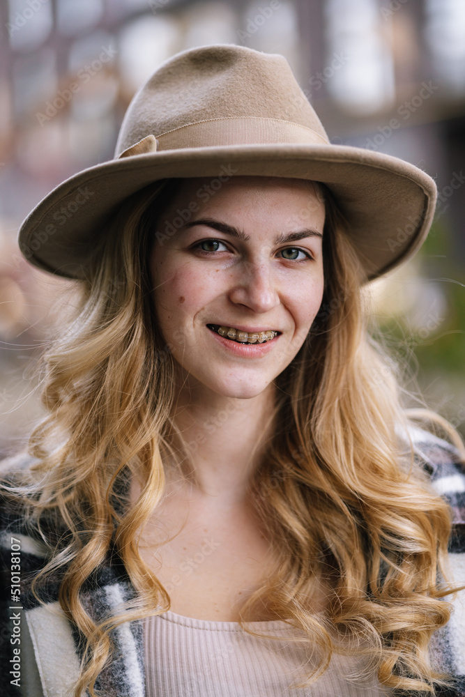 Adorable female model smiling and looking at camera Adorable female model smiling and looking at camera