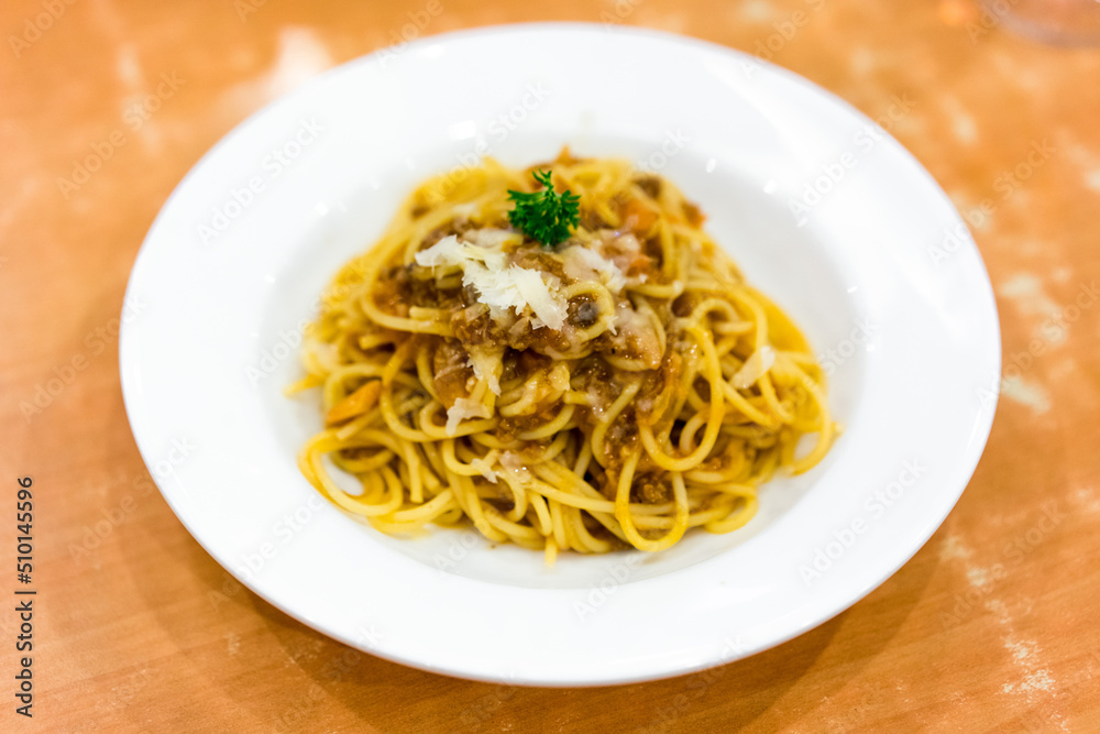 A dish of spaghetti on the table