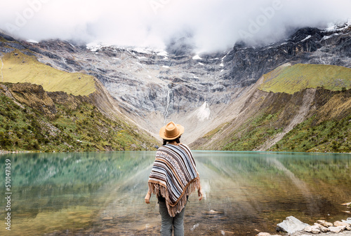 Woman contemplating the Humantay lake